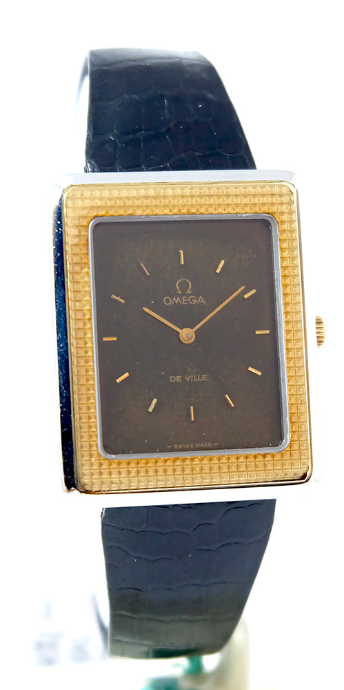 Omega Tank Clous de Paris or acier 1974