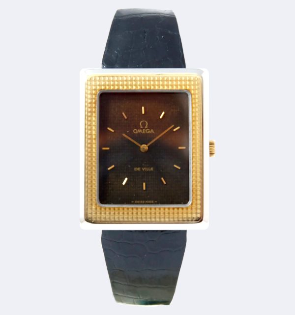 Omega Tank Clous de Paris or acier 1974