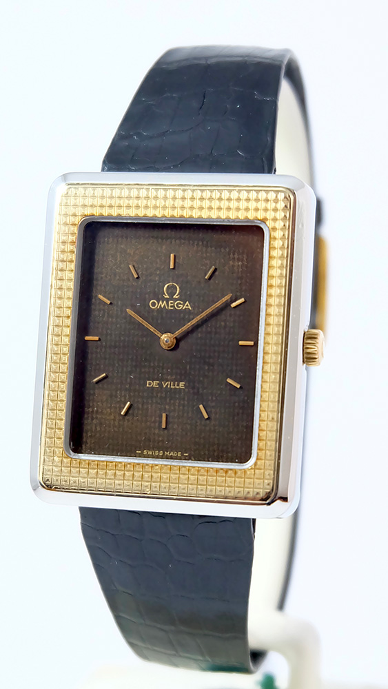 Omega Tank Clous de Paris or acier 1974